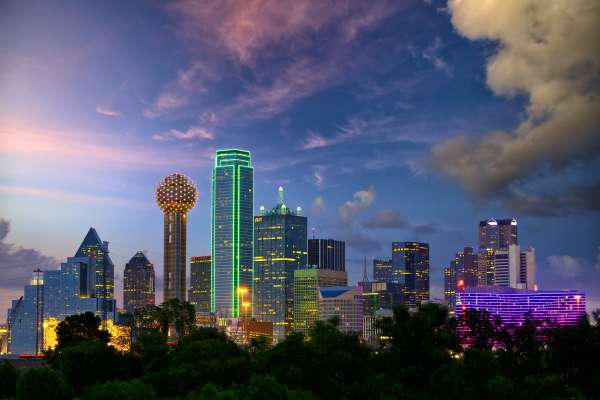 Photo of Dallas City Skyline at night with beautiful lighting.